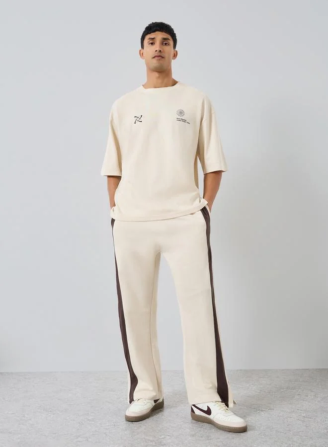 Styli Men Beige Striped Relaxed Joggers